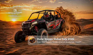 Tourists enjoying an exciting dune buggy ride across the golden sand dunes in Dubai's desert.
