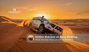 Motion sickness during Dubai desert dune bashing.