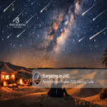 People enjoying stargazing in the UAE desert while watching the Perseid Meteor Shower 2026 illuminate the night sky.