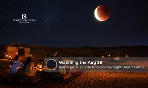 August 28 partial lunar eclipse at a desert camp.