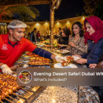 Travellers enjoying a traditional BBQ dinner under the stars after a Dubai desert safari.